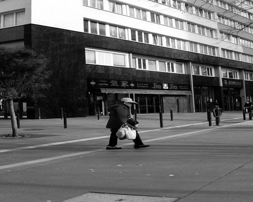 Smiling individual walking in the morning